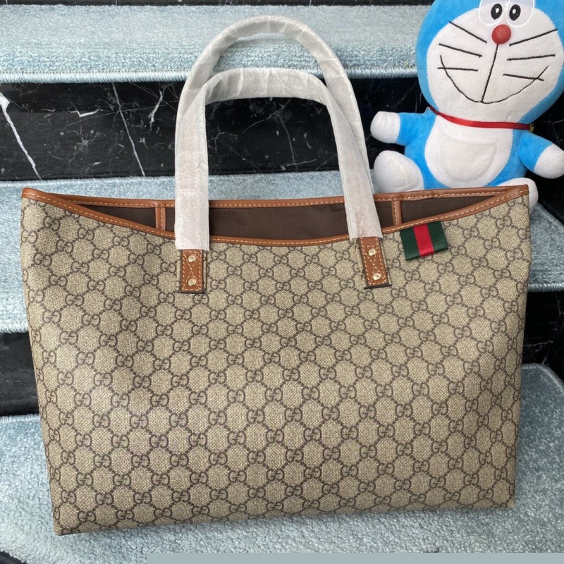 G*u*i shopping bags